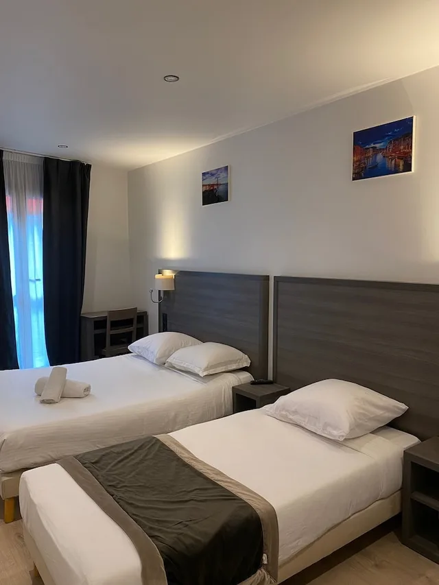 غرفة ثلاثية بسرير فردي، Hotel Residence Chatillon 1/8