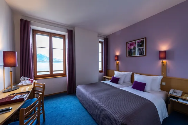غرفة قياسية بسرير كوين بإطلالة على البحيرة، Hotel Bon Rivage 1/10