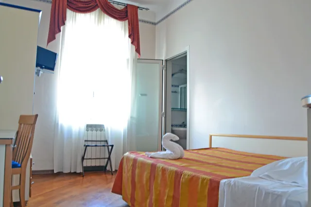غرفة ثلاثية بسرير مزدوج وسرير فردي، Hotel Soggiorno Athena 1/10