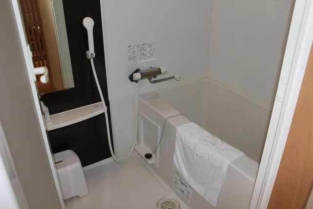 غرفة يابانية غربية بفراش فوتون، Shiretoko Daiichi Hotel 7/8