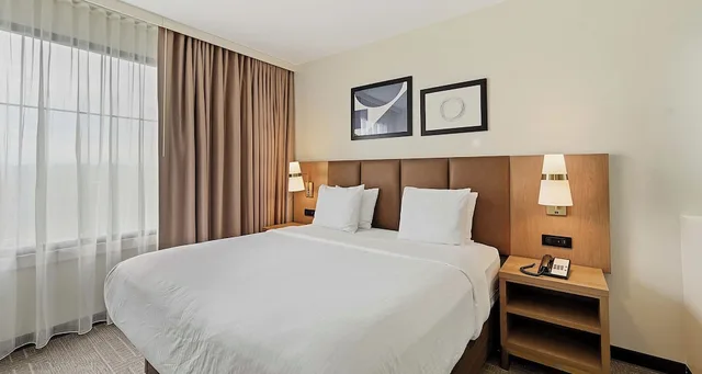غرفة قياسية بسرير كوين مع أريكة بمطبخ، Best Western Plus Hannaford Inn & Suites 2/4