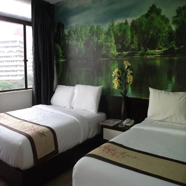 غرفة عائلية رباعية بسريرين كوين بإطلالة على المدينة، Swiss Hotel 2/2