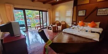غرفة حصرية بإطلالة على المسبح بشرفة، Andamanee Boutique Resort Aonang Krabi 1/2