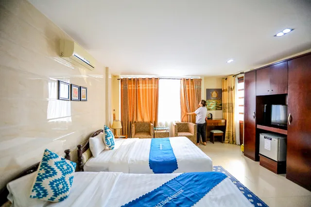 غرفة ديلوكس بإطلالة على المدينة، DMZ Hotel 1/3