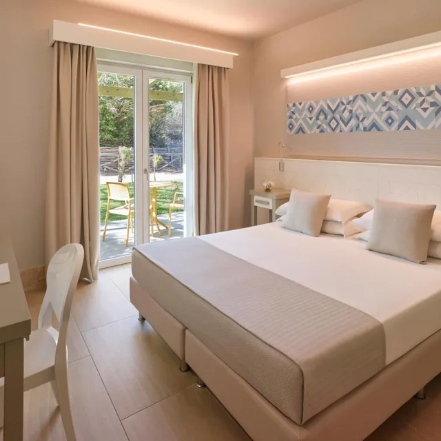 Room, Double or Twin Bed, Private Garden، Is Serenas Badesi Resort 1/5