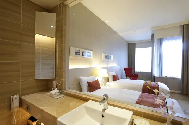 غرفة ديلوكس بسريرين منفصلين في طابق منخفض، Hotel Riverview Taipei 1/1