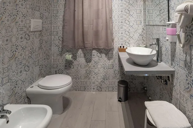 غرفة ديلوكس ثلاثية بإطلالة على البحر في الملحق، B&B Le 4 Stagioni Dante's Suites 4/5