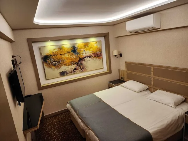 غرفة عائلية بسرير مزدوج وسريرين منفصلين، Nanda Hotel 2/3
