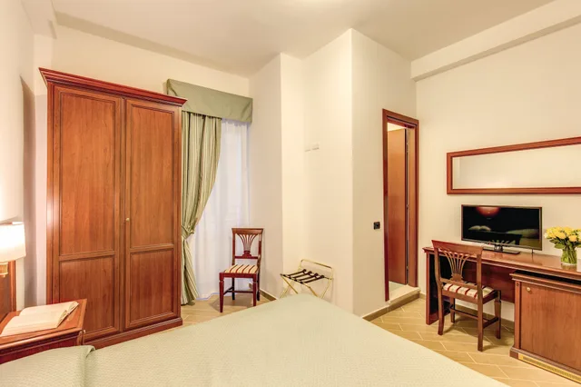 غرفة رباعية بسرير مزدوج وسرير بطابقين، Hotel Flavio Rome 1/2