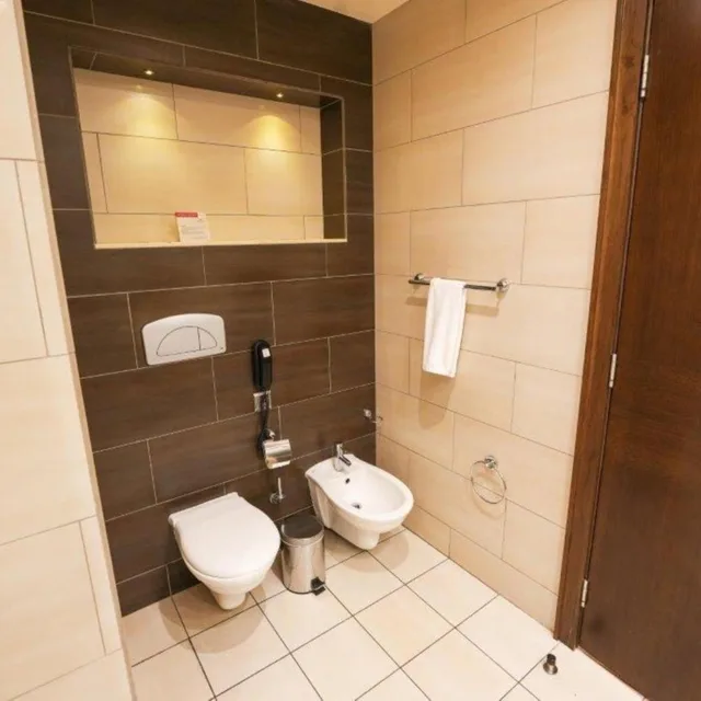 غرفة ديلوكس بسرير فردي للمدخنين، Ramada by Wyndham Abu Dhabi Downtown 9/10