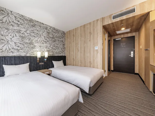 غرفة قياسية بسريرين منفصلين للمدخنين، Nishitetsu Resort Inn Naha 1/10