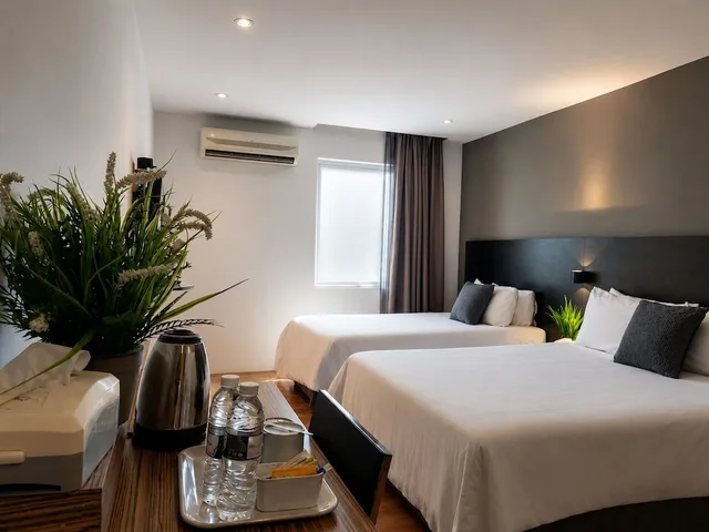غرفة ديلوكس ثلاثية بسرير كوين وسرير فردي، The Leverage Business Hotel Kuala Kedah 3/8