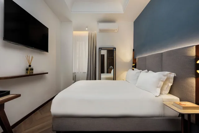 غرفة ديلوكس بسرير كوين، Boutique Hotel Piedra Rome City Centre 1/3