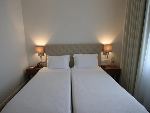 غرفة بريميوم بسرير كوين مع أريكة، Consolata Hotel 1/4