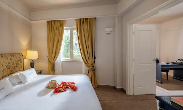 جناح بسريرين منفصلين بإطلالة على الحديقة مع أريكة، Altafiumara Resort & Spa 1/10