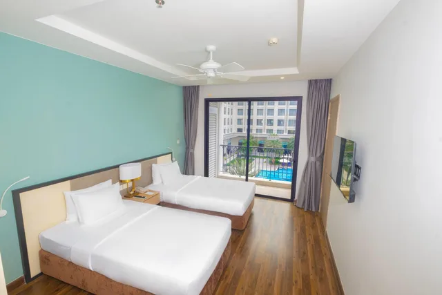 غرفة بسريرين منفصلين بإطلالة على البحر، Wyndham Garden Grandworld Phu Quoc 1/7