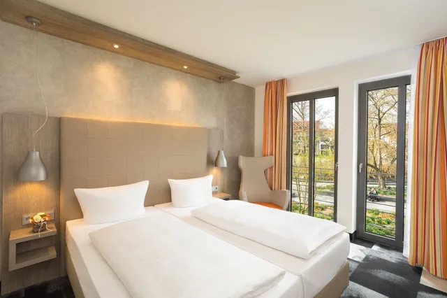 غرفة كلاسيكية بسرير مزدوج بإطلالة على المدينة، Hotel Kramerbrucke Erfurt 1/2
