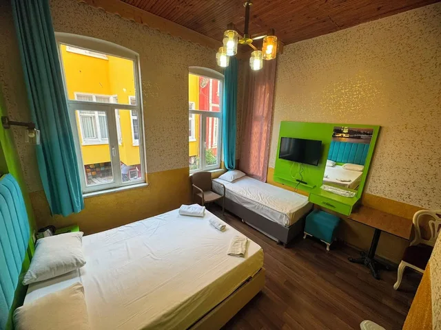 غرفة قياسية ثلاثية بسرير كوين وسرير فردي، Megaron Hotel 1/1