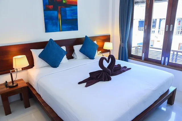 غرفة قياسية بسرير كينج بإطلالة على المسبح، Sairee Cottage Resort 1/2