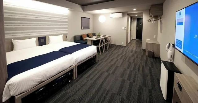 غرفة بسريرين منفصلين وفرشتي فوتون مع أريكة، Monday Apart Premium Akihabara Asakusabashi Station 2/5