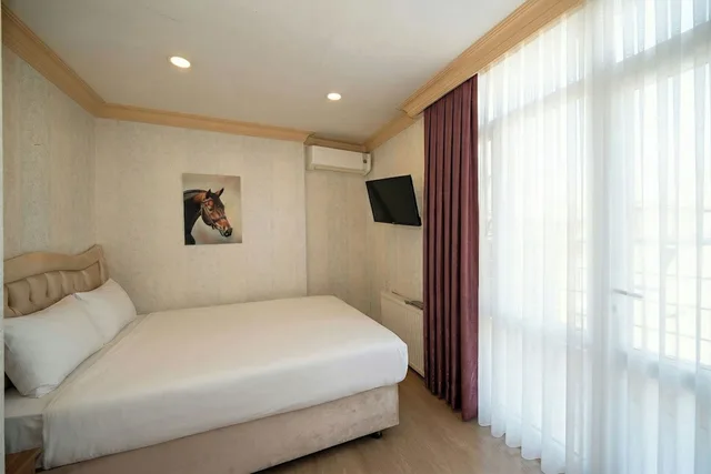 غرفة ديلوكس بسرير كوين بشرفة، Taksim Maxwell Hotel 3/10