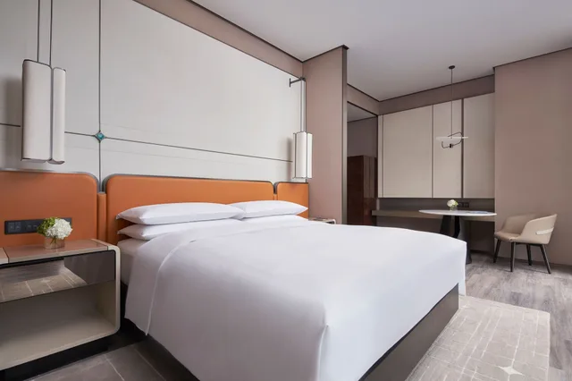 غرفة ديلوكس بسرير كينج، Tianjin Marriott Hotel National Convention and Exhibition Center 1/7