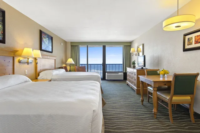 غرفة قياسية بسريرين كوين بإطلالة جزئية على البحر بمطبخ، Nautilus Inn 1/10