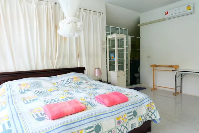 جناح عائلي بسريرين مزدوجين بغرفتي نوم، Franjipani Home 1/3
