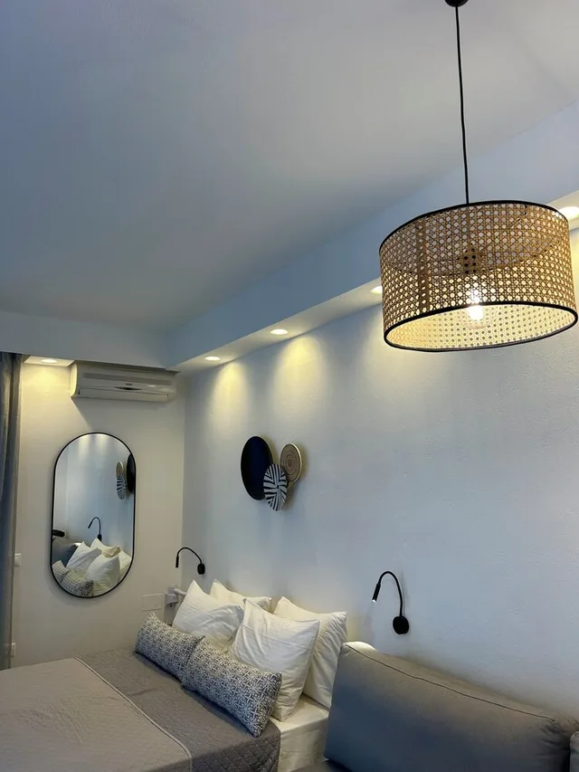 غرفة ديلوكس ثلاثية بسرير كوين بشرفة مع أريكة، Sea View Apartments and Studios 7/10