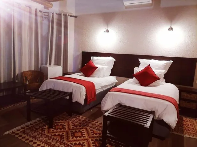 غرفة كومفورت رباعية بغرفتي نوم، Shingalana Guest House 1/2