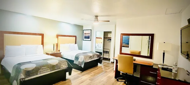 Room, 3 Double Beds, Oceanside Inn and Suites a Days Inn by Wyndham 3/5