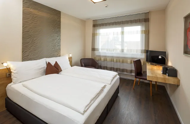 غرفة بسرير مزدوج أو سريرين منفصلين، Villmergen Swiss Quality Hotel 2/10