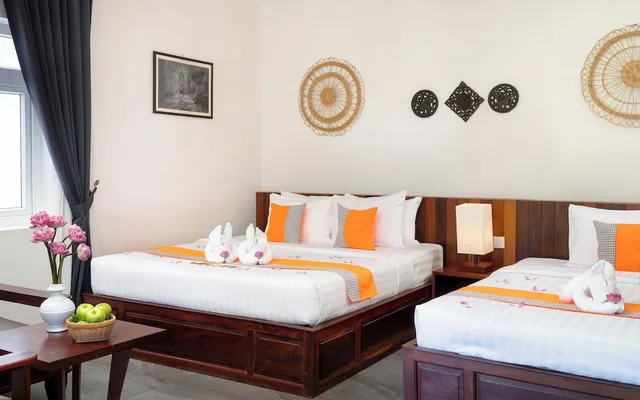 غرفة ديلوكس عائلية بسرير كوين بشرفة، Indra Angkor Residence 1/10