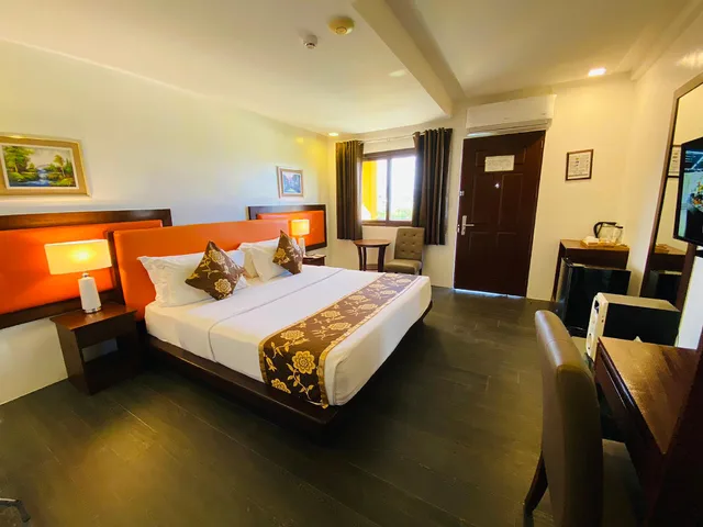 Grand Paradise Superior Deluxe، Paradise Garden Resort Hotel and Convention Center 1/1