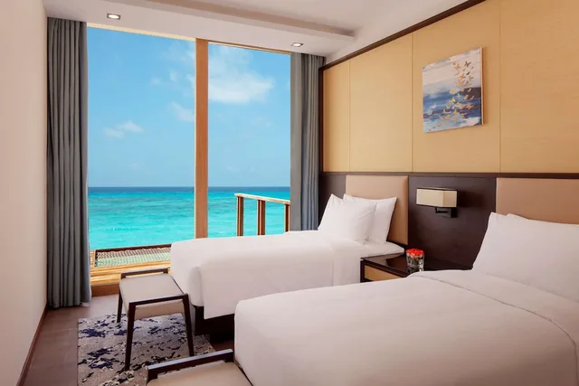 3 Bedrooms, Water Villa, Sunset, 2 King Beds, Private Pool, Lounge Access, Radisson Blu Resort Maldives 2/7