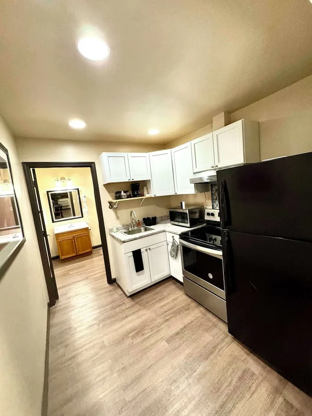 Family Suite, Premium, 2 Queen Beds, No Elevator، Americas Best Value Inn Marquette 4/5