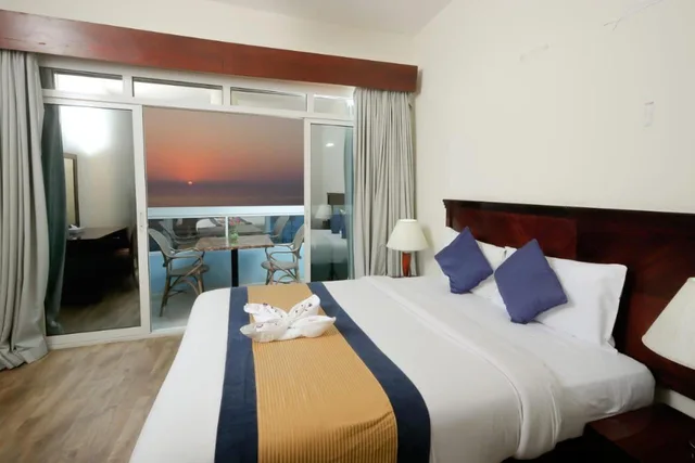 غرفة ديلوكس بإطلالة على البحر بشرفة، Mermaid Beach Hotel 4/10