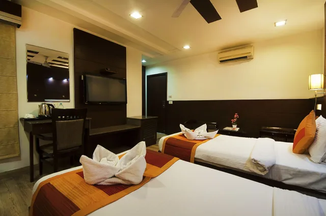غرفة بريميوم بسرير مزدوج، Amaltas International 1/5