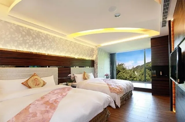 غرفة ديلوكس رباعية بسريرين مزدوجين، Shuian Lakeside Hotel 2/2
