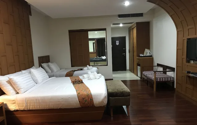 جناح جونيور ثلاثي بسرير كينج وسرير فردي، Taman Spa Resort 1/10