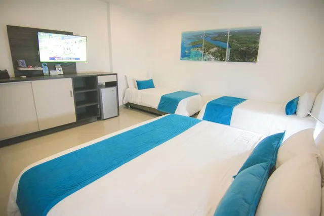 غرفة قياسية رباعية بسريرين مزدوجين، Hotel Poblado Covenas 4/5