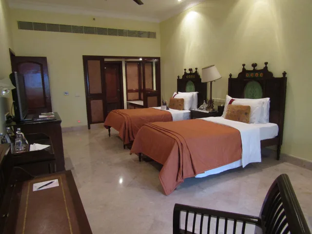 جناح بسريرين منفصلين بإطلالة على الحديقة، The Lalit Golf And Spa Resort Goa 2/5