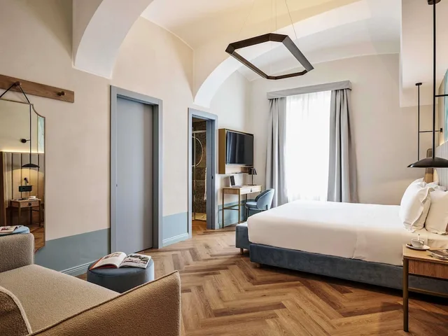 غرفة ديلوكس بسريرين منفصلين مع أريكة، Hotel Giacomo Morra Alba - Handwritten Collection 1/5