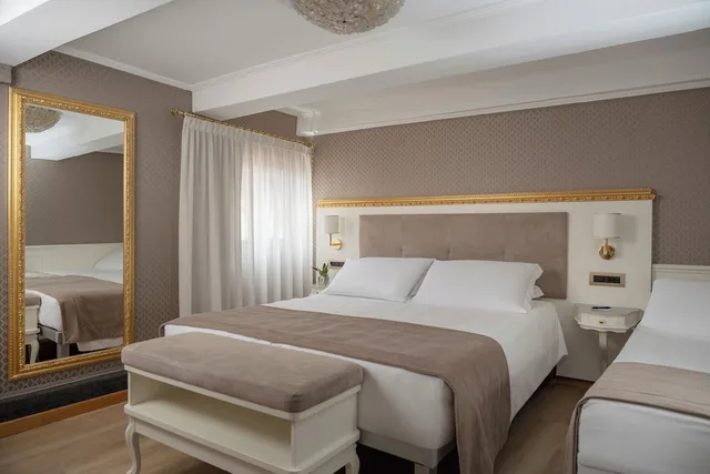 غرفة كلاسيكية ثلاثية بثلاثة أسرّة، Hotel Montecarlo 1/10