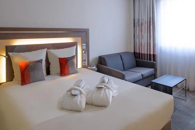 غرفة تنفيذية بسرير كينج مع أريكة، Novotel Lugano Paradiso 3/10