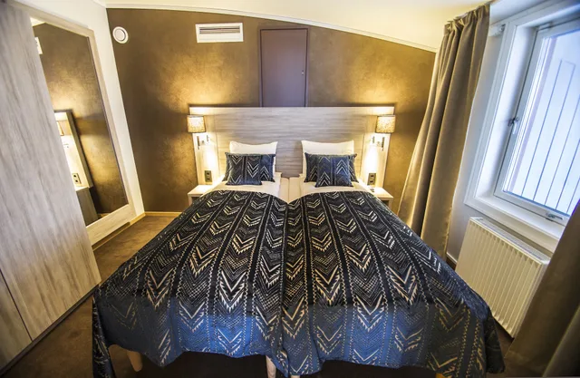 غرفة عائلية بسرير مزدوج، Radisson Blu Polar Spitsbergen 3/6