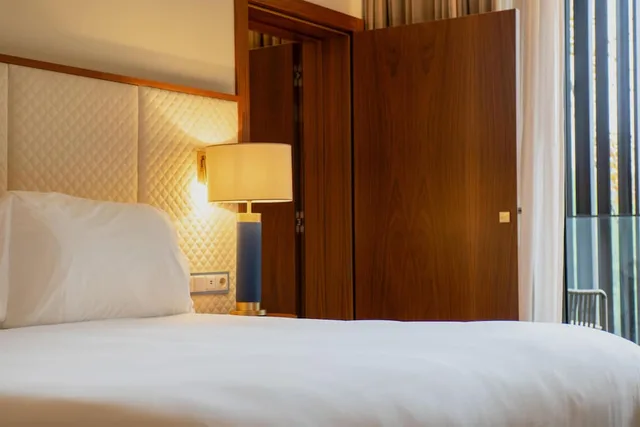 غرفة عائلية بسرير كينج بشرفة، Boeira Garden Hotel Porto Gaia, Curio Collection by Hilton 2/6
