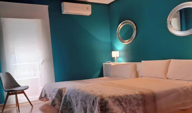 غرفة أساسية رباعية بسرير مزدوج وسريرين منفصلين، C&H Aravaca Garden 1/1