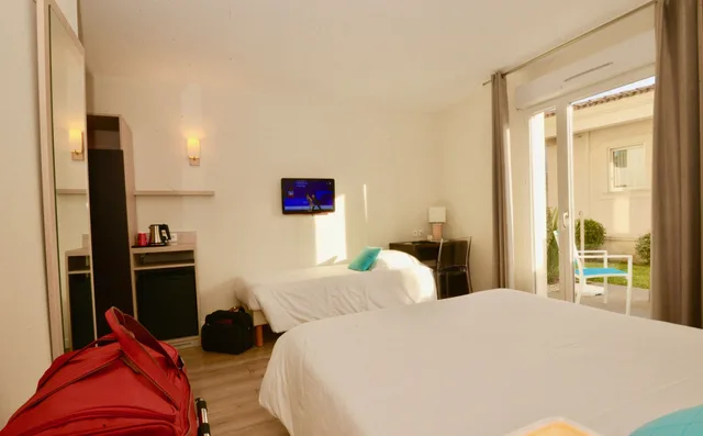 غرفة ثلاثية بسرير كوين وسرير فردي، Hotel Le Mas Du Golf 2/2