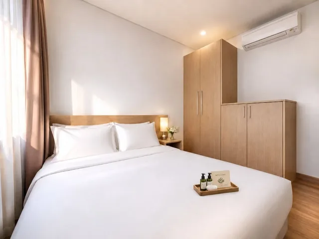 شقة ديلوكس بسرير كوين وسرير مزدوج بإطلالة على المدينة بغرفتي نوم، G8 Center Hotel Saigon 2/10